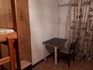 Гостевой дом Nursat Guest House Нур-Султан Четырехместный номер с собственной ванной комнатой вне номера-1